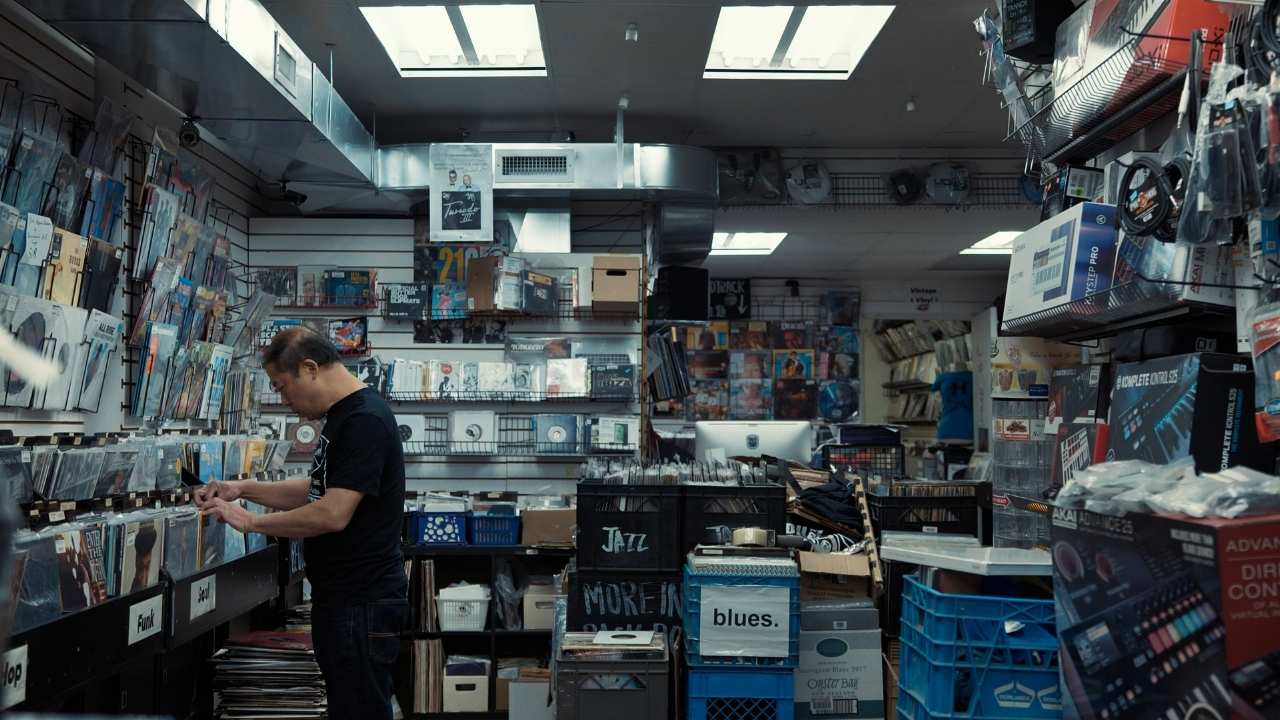 a man browsing in a record shop